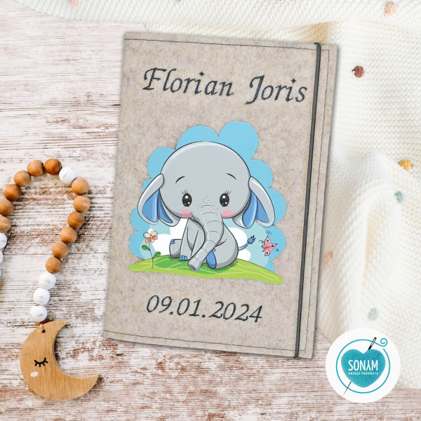 U-Heft Hülle beige meliert Designbeispiel Elefant Junge auf Wiese